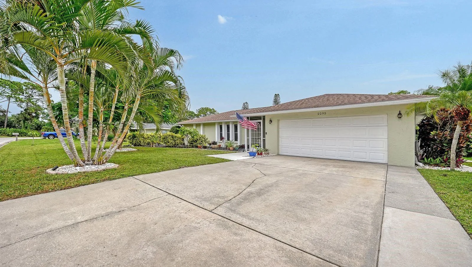 2 Car Garage and spacious driveway for extra parking.