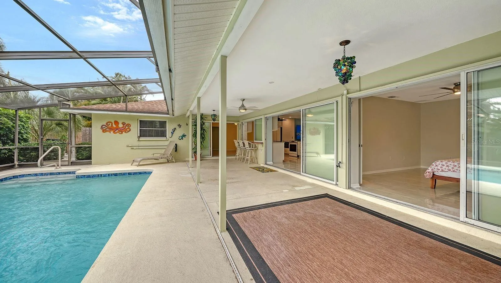 3 sets of sliders to the Lanai & Pool Area.