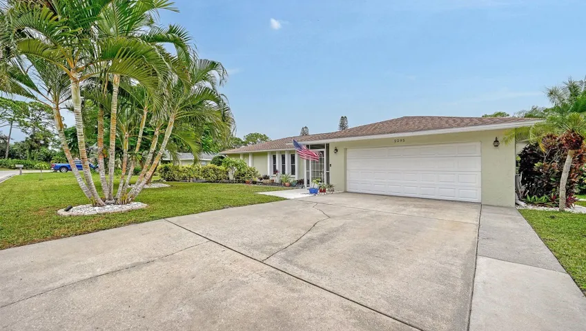 2 Car Garage and spacious driveway for extra parking.
