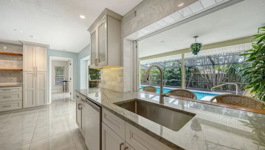 Kitchen Window slides open to the Lanai; great for entertaining guests!