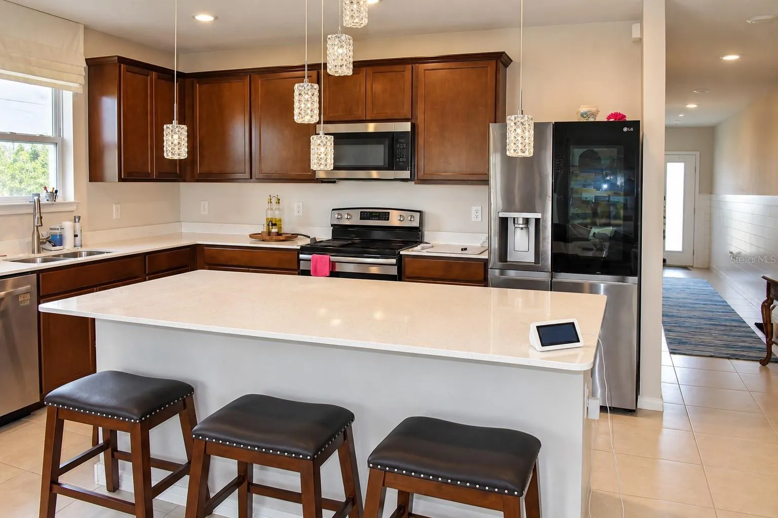 Stainless Steel Appliances and Ample Cabinetry