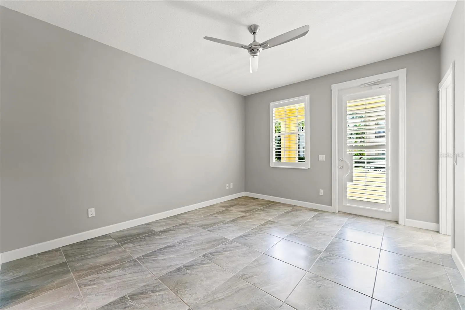 Primary bedroom in first floor with access to the porch