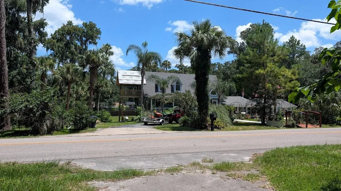 House across from the driveway on 7th Ave. Road