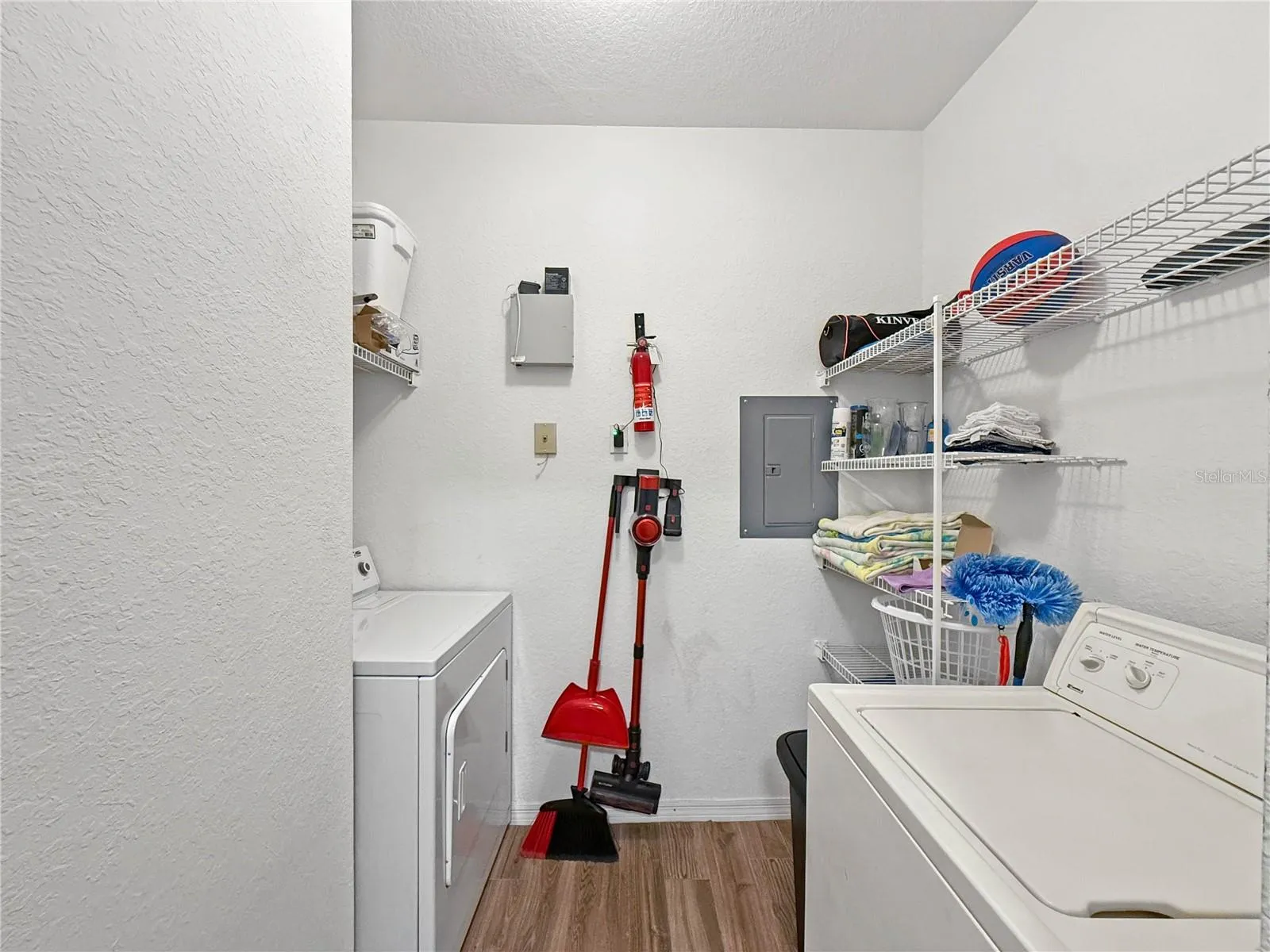 Laundry and storage room off kitchen