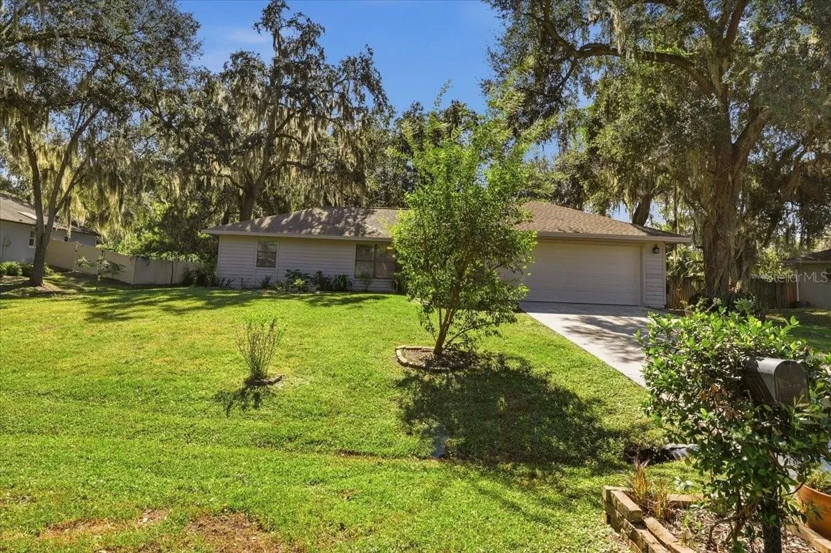 Nice large front lawn landscaped.