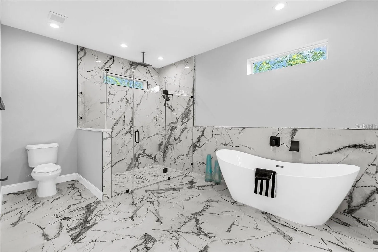 Master Bathroom With Shower & Separate Soaking Tub