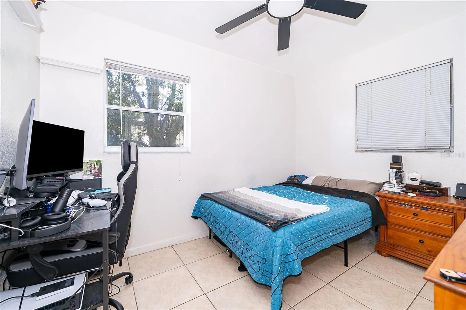 This versatile bedroom offers flexibility for guests, a home office, or additional living space to suit your needs.