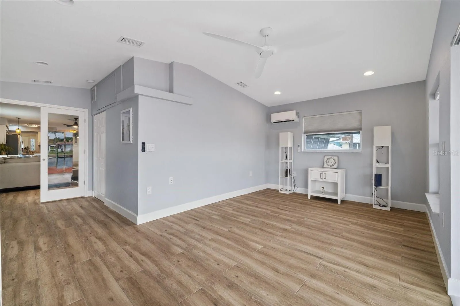 Back bedroom or office/sitting room with french doors