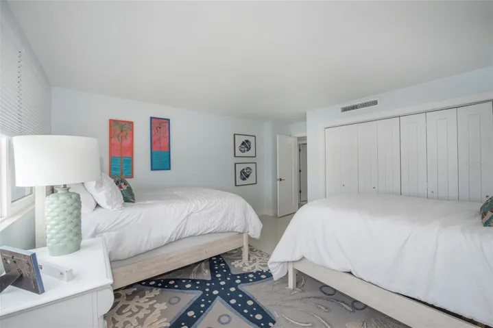 Bedroom II with full wall of views from windows