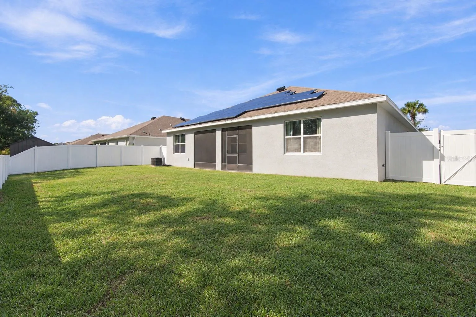 Backyard facing house