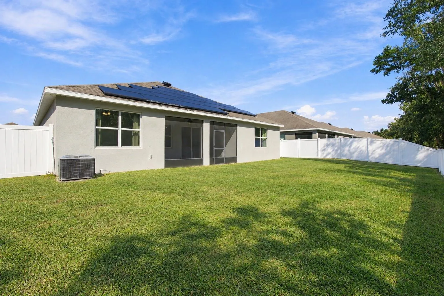 Backyard facing house