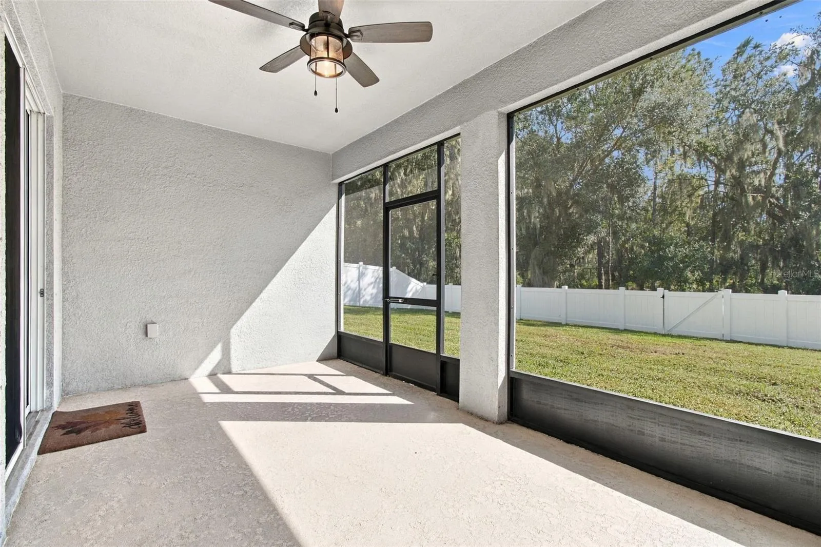 Screened-in Patio with ceiling fan