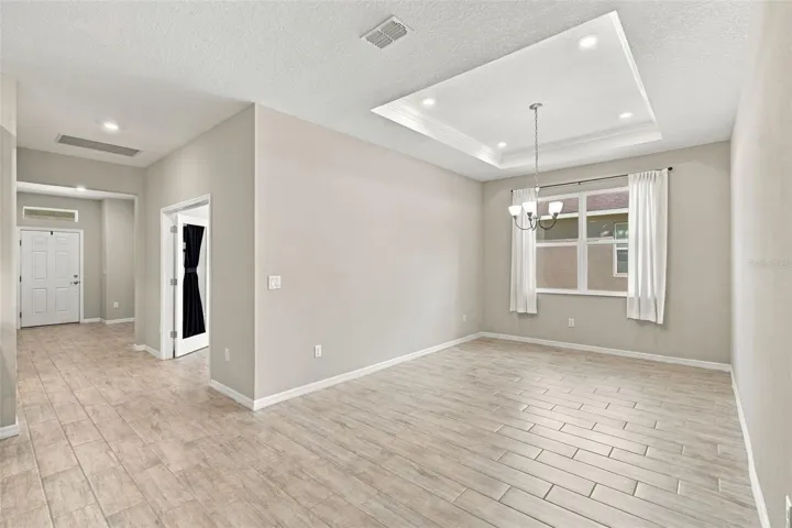 Dining Room with tray ceiling