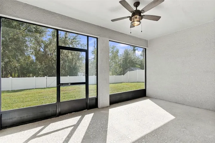 Screened-in Patio with ceiling fan