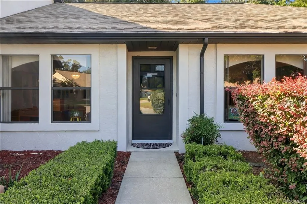 COME ON IN! Inviting COVERED FRONT ENTRY w/a charming walkway, decorative landscaping &amp; contrasting dark front door!