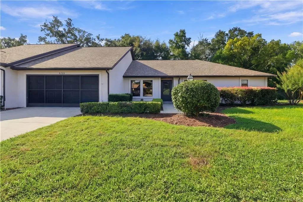 WELCOME HOME TO MEADOWCREST! CURB APPEAL THAT SHINES! Welcoming front elevation features a contrasting DARK GARAGE DOOR, covered entry &amp; beautifully maintained landscaping!