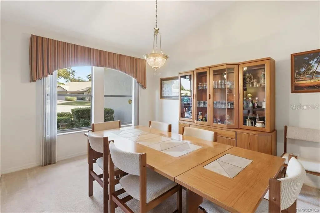 DINING IN STYLE! Another perspective of the FORMAL DINING ROOM showcases its spacious layout, attractive lighting &amp; natural light!