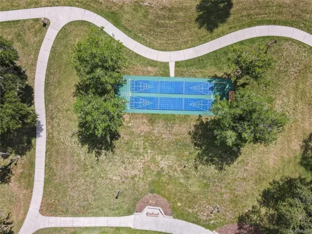 SHUFFLEBOARD COURTSLET THE GOOD TIMES ROLL! Enjoy friendly competition on the community's TWO SHUFFLEBOARD COURTS, surrounded by green space, mature shade trees &amp; scenic walking paths!