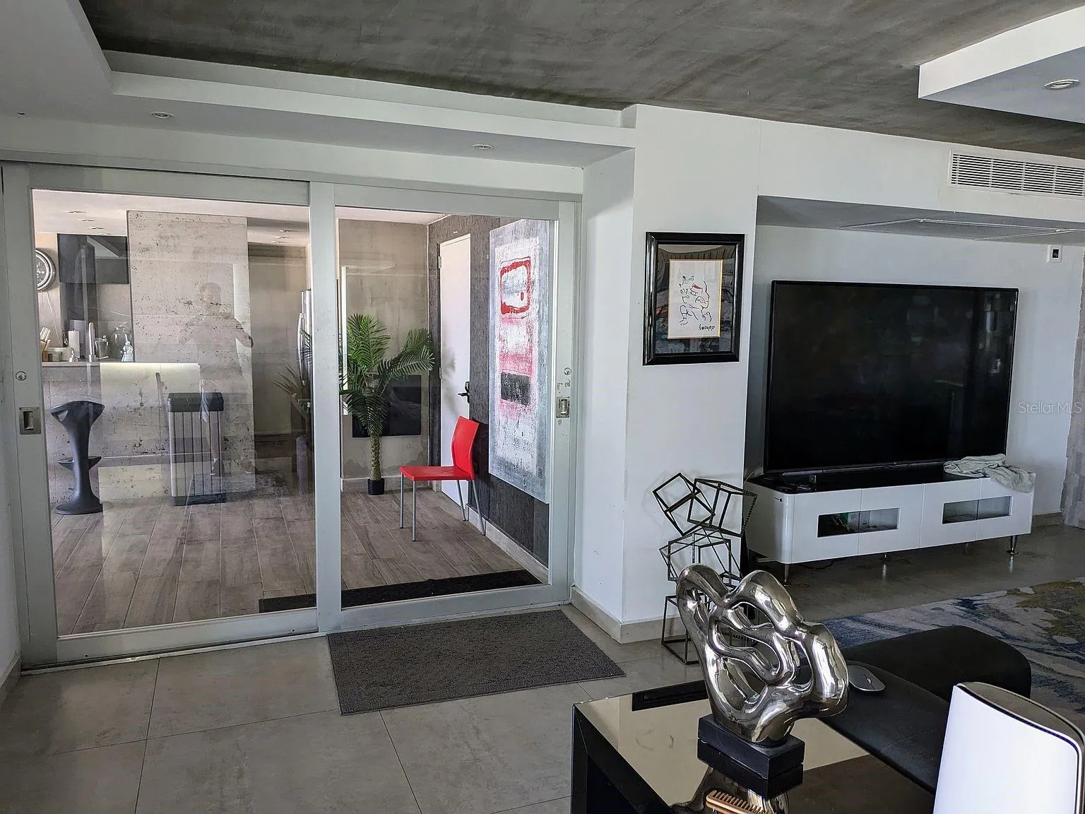 Living area – glass sliders to covered terrace