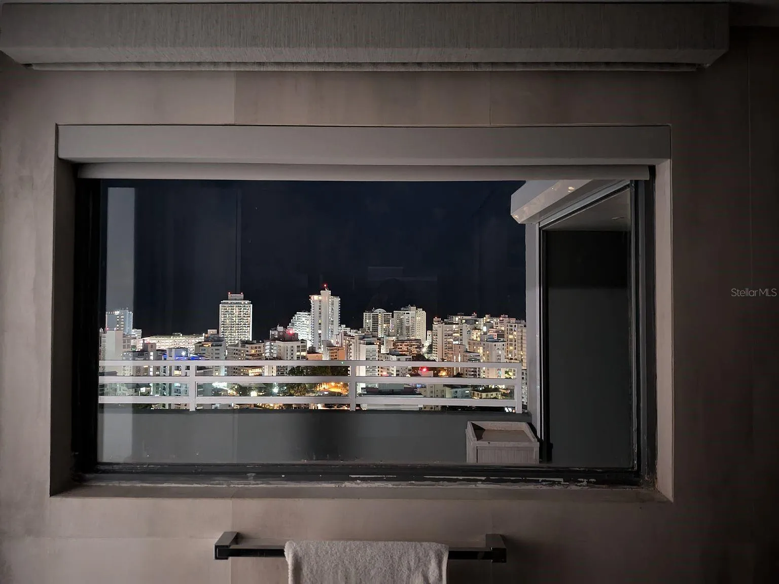 Bathroom window – night skyline view