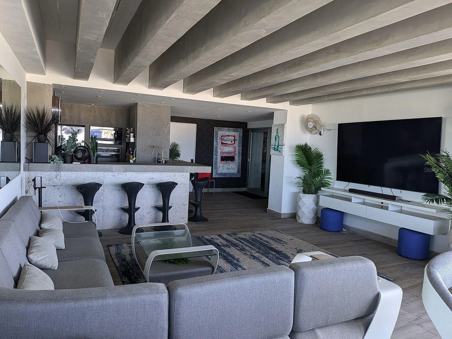 Terrace – full second kitchen and bar with media wall