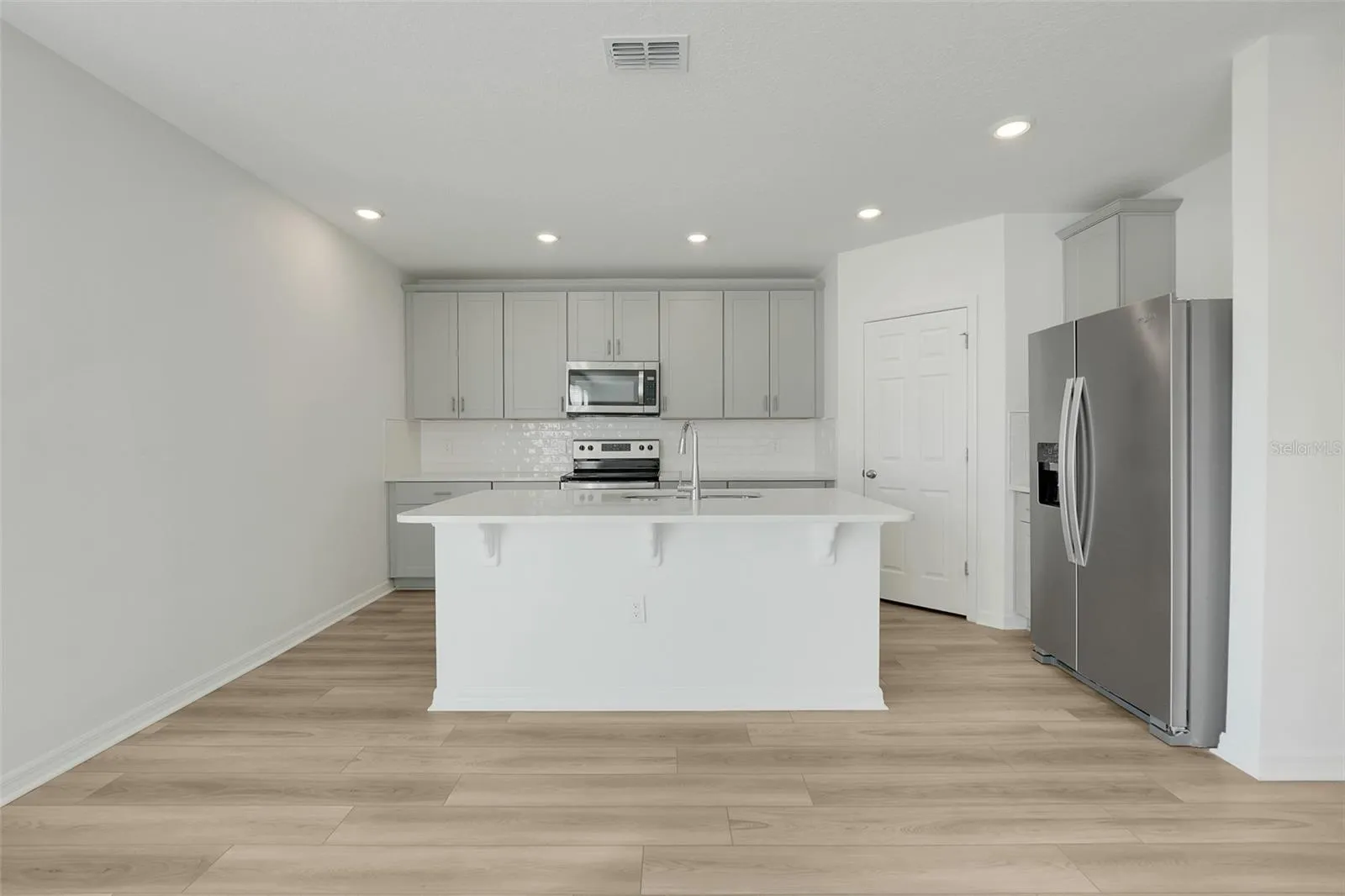 Kitchen area with upgraded finishes
