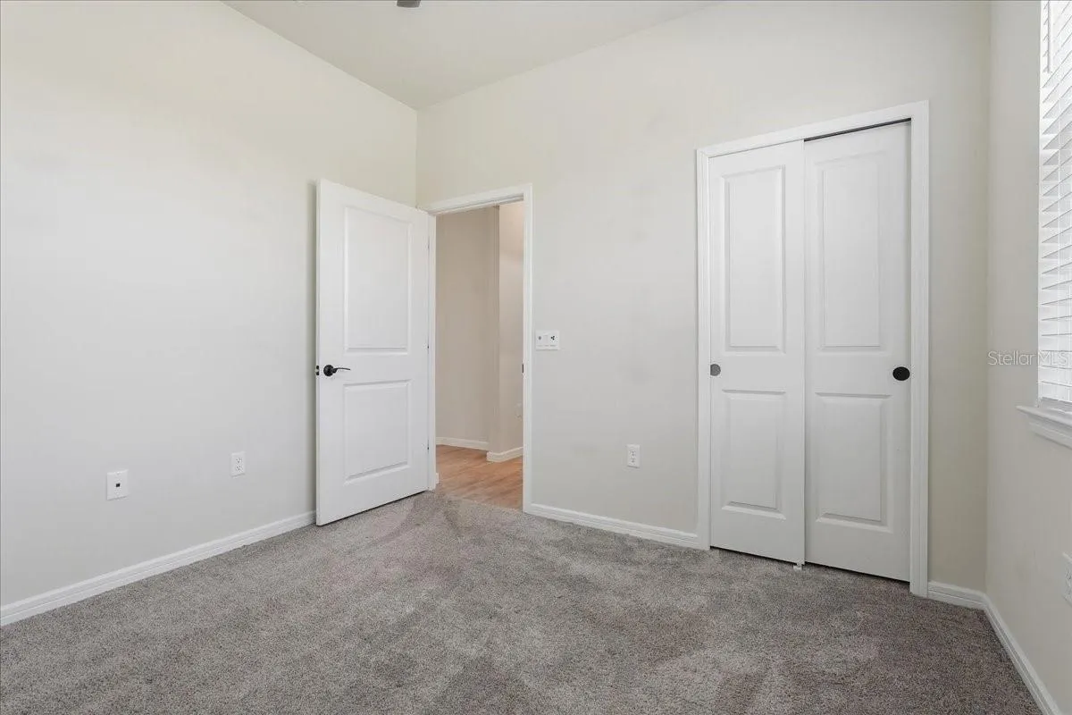 Bedroom 2 with Lighted Ceiling Fan