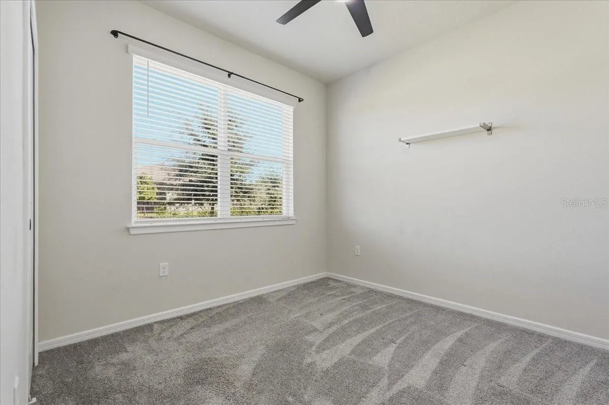 Bedroom 2 with View to Side Yard