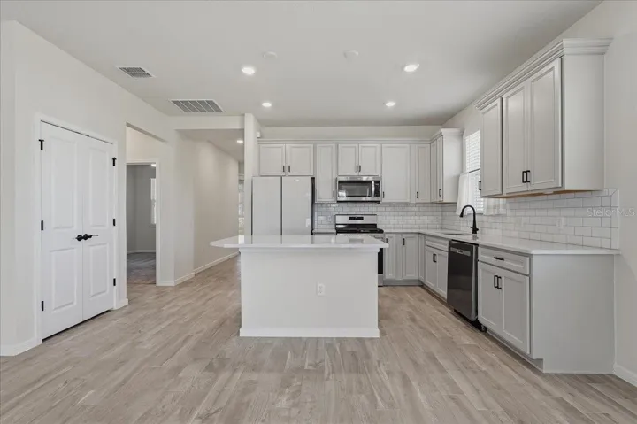 Kitchen - Double Doors on left are the Closet Pantry