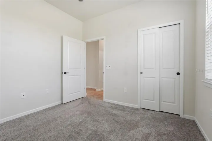 Bedroom 2 with Lighted Ceiling Fan