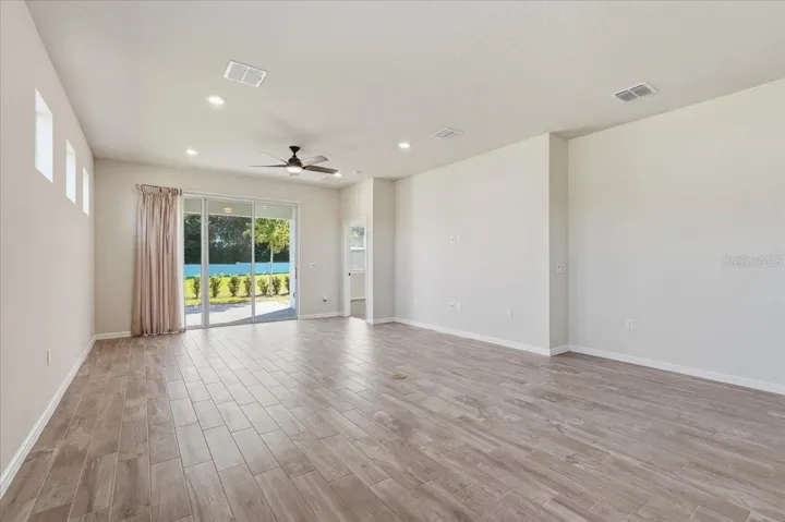 Cafe and Gathering Room - Sliding Doors to Pavered Lanai