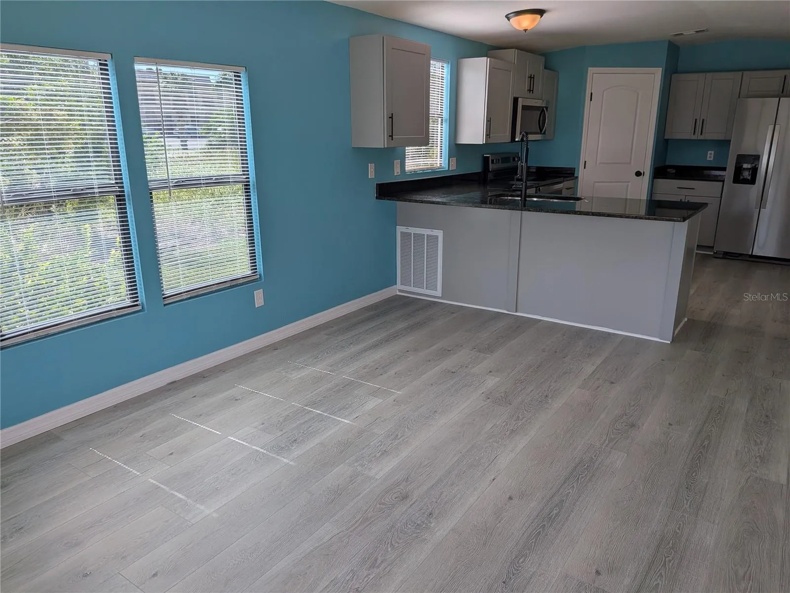 LIVING AREA FACING KITCHEN