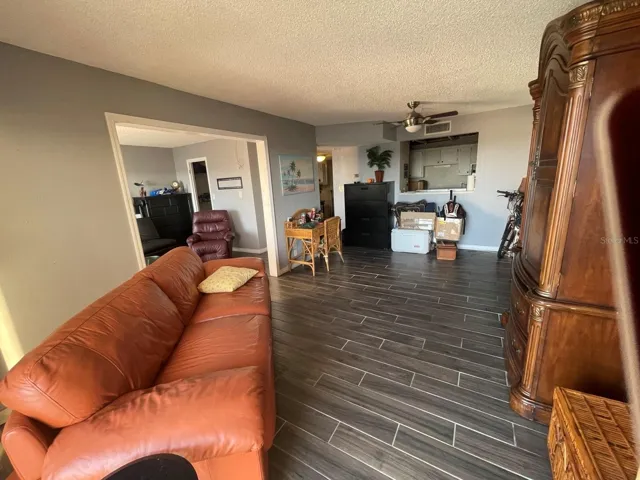 Additional view of open floor plan with adjoining living areas from balcony