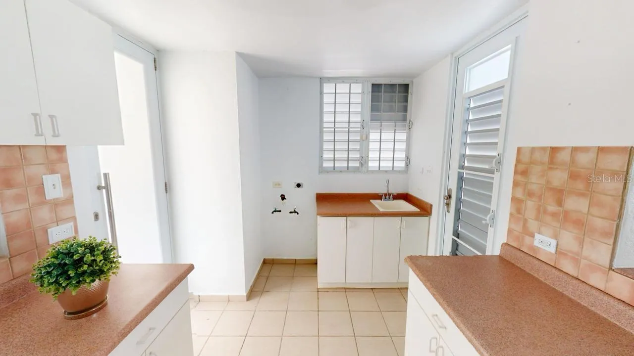 KITCHEN WITH LAUNDRY AREA