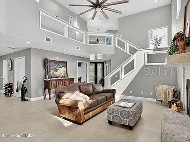 formal living room with natural gas fireplace