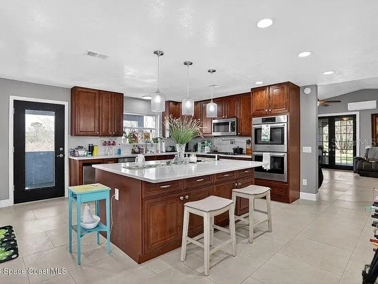 kitchen with 7 ft by 5 ft island