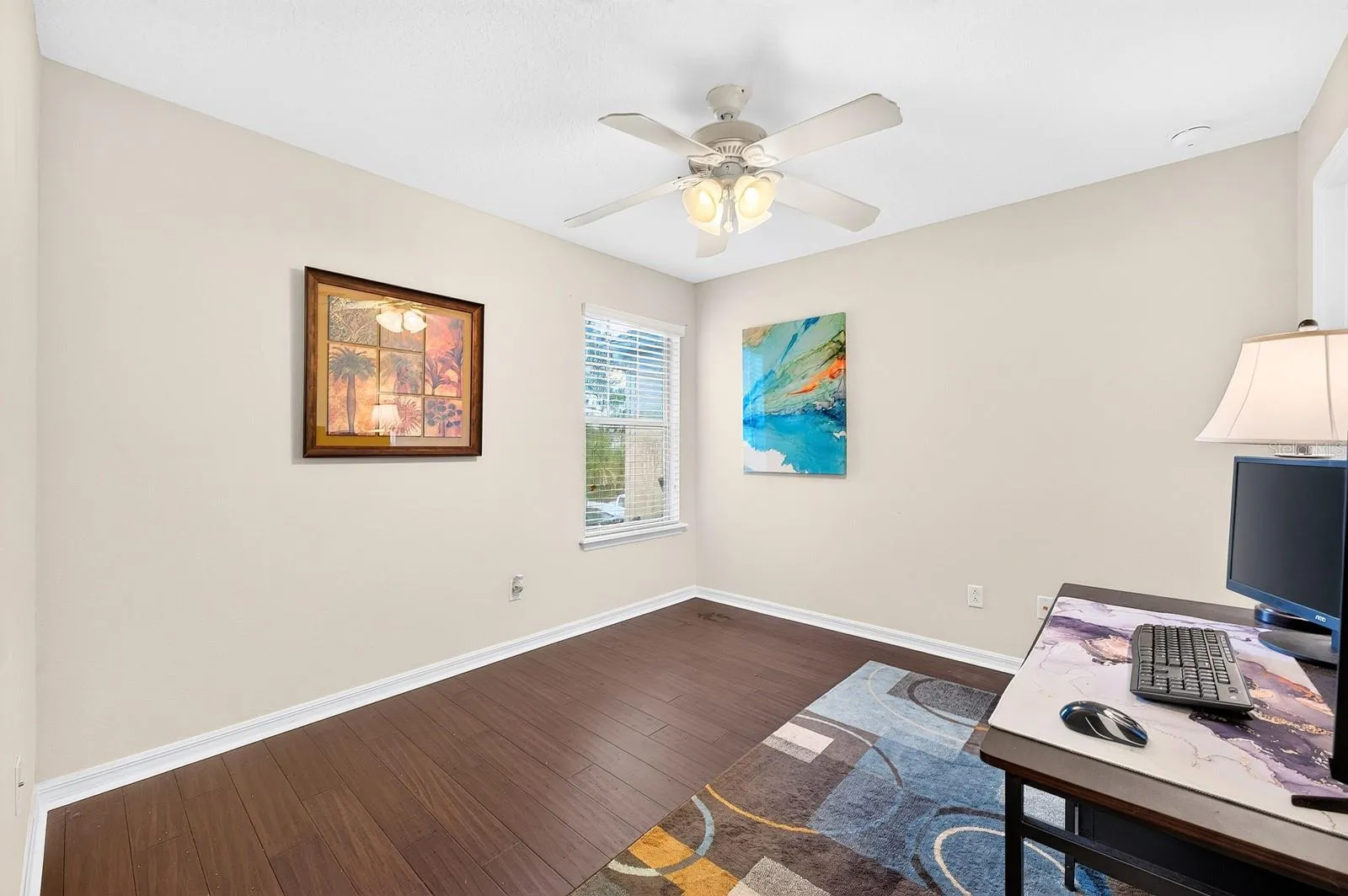 Bedroom 3 offers LVP FLOORING INSTALLED IN 2020 and its own walk-in closet.