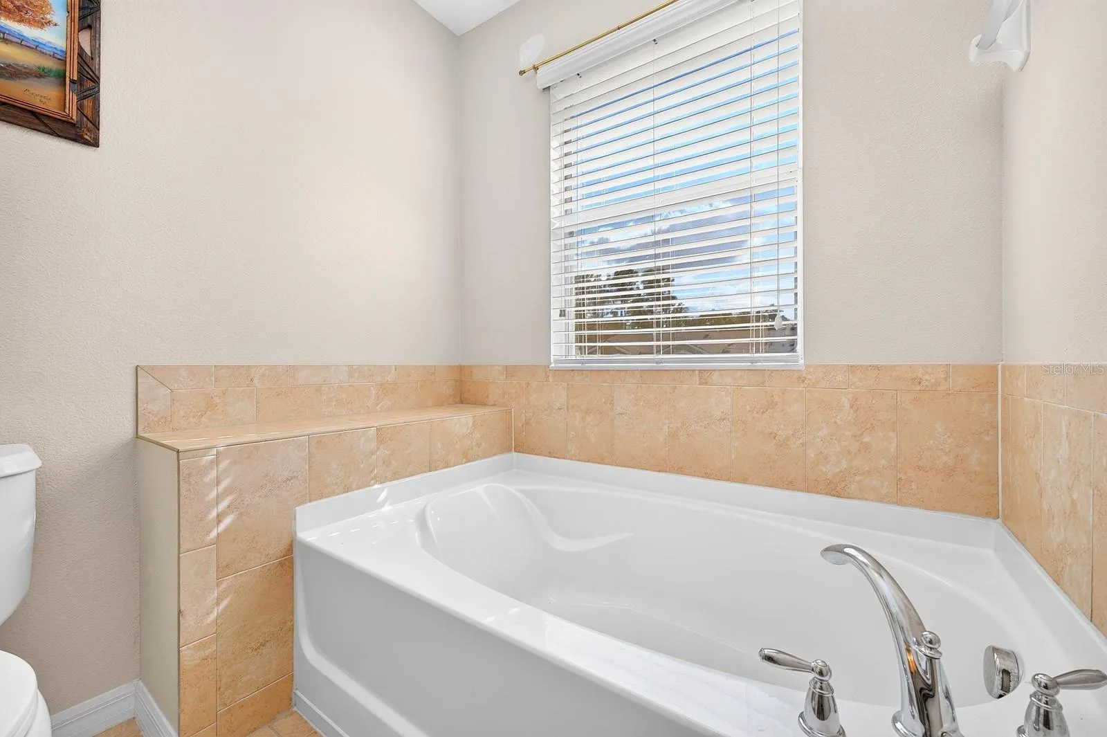 Relax in the garden tub after a long day of work.