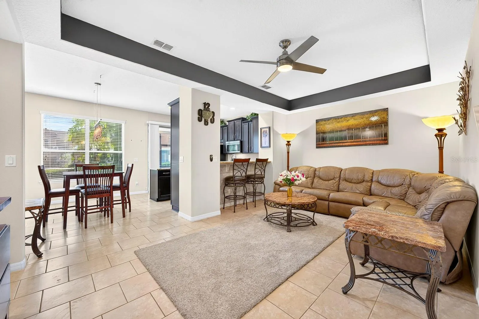 A large Dining Room window brings in lots of NATURAL LIGHT.