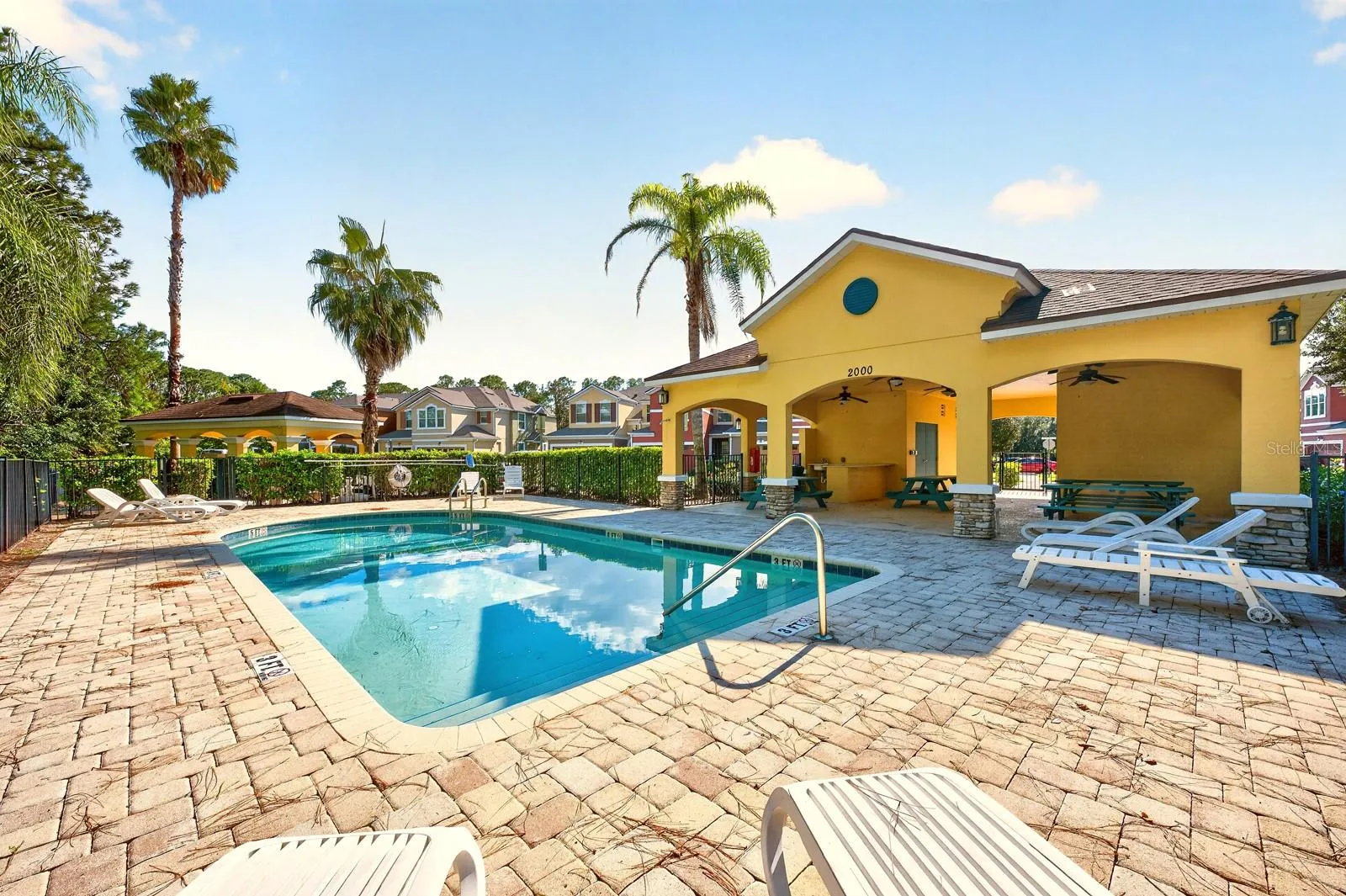 The SPARKLING COMMUNITY POOL, located close to the home—makes it easy to enjoy a refreshing swim without the work of maintaining a pool yourself.