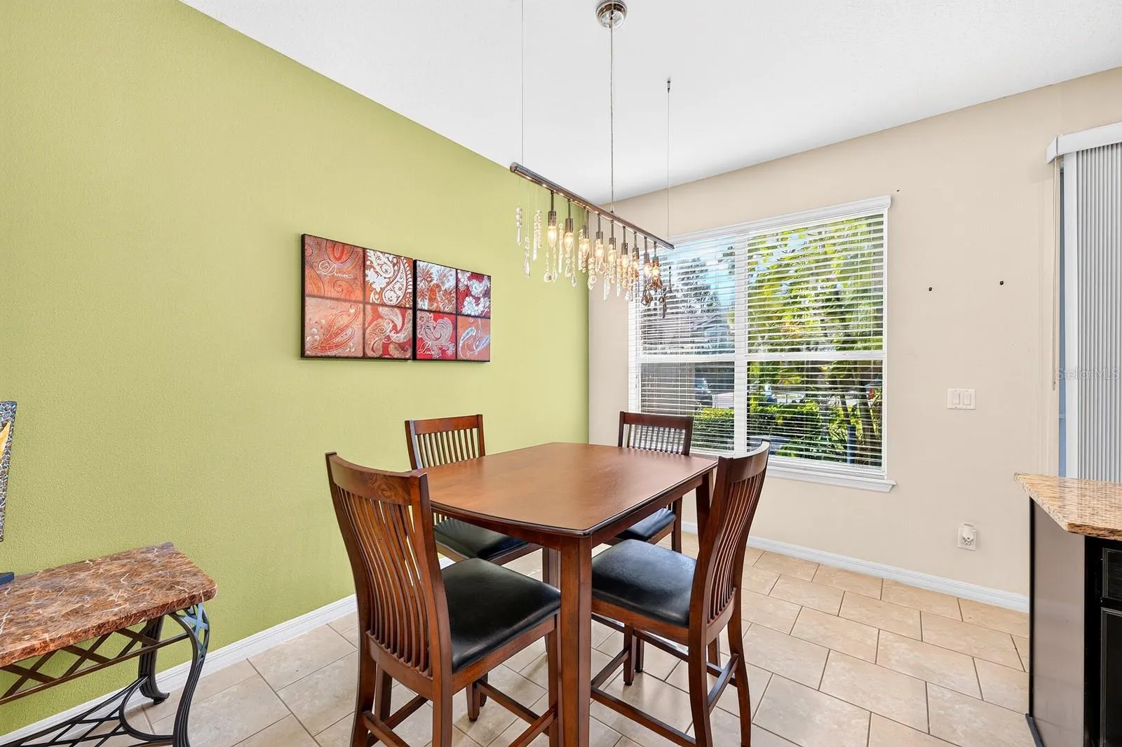 A charming Dining area sits just off the Kitchen.