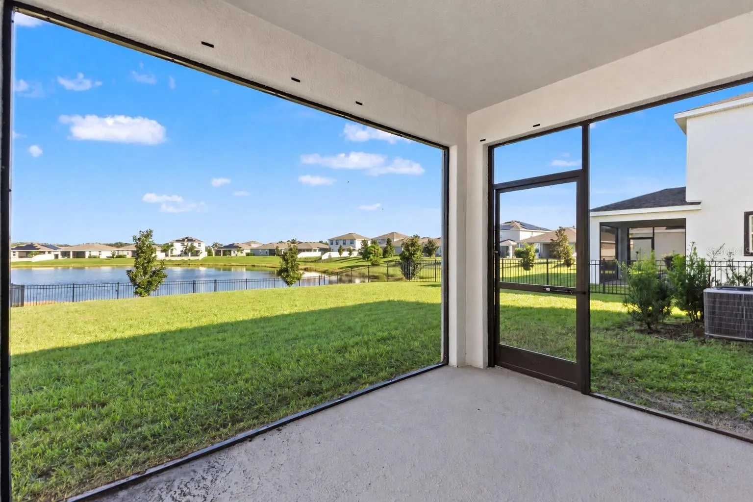 Screened lanai corner view - 5126 Jackel Chase Dr, Wimauma