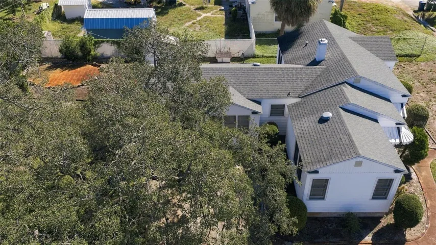 Overhead West side of house and driveway looking east