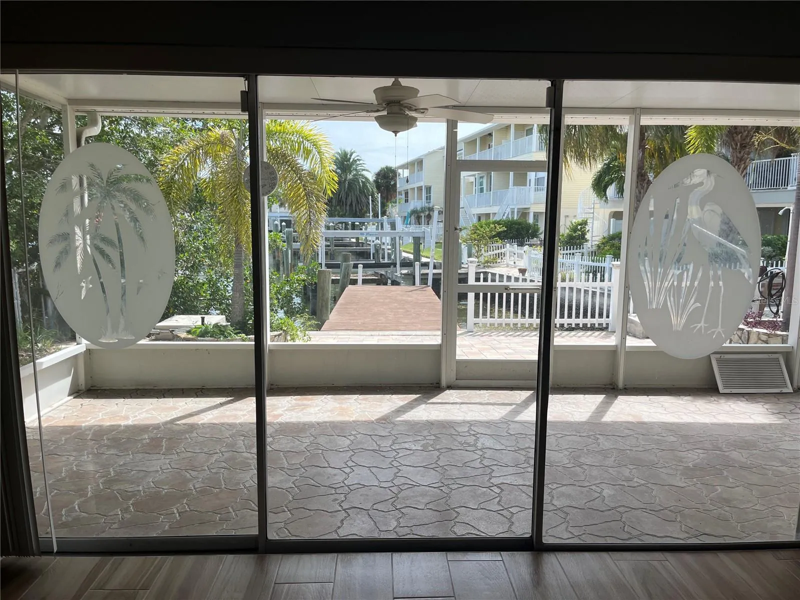 Decorative sliding doors to the covered outside patio