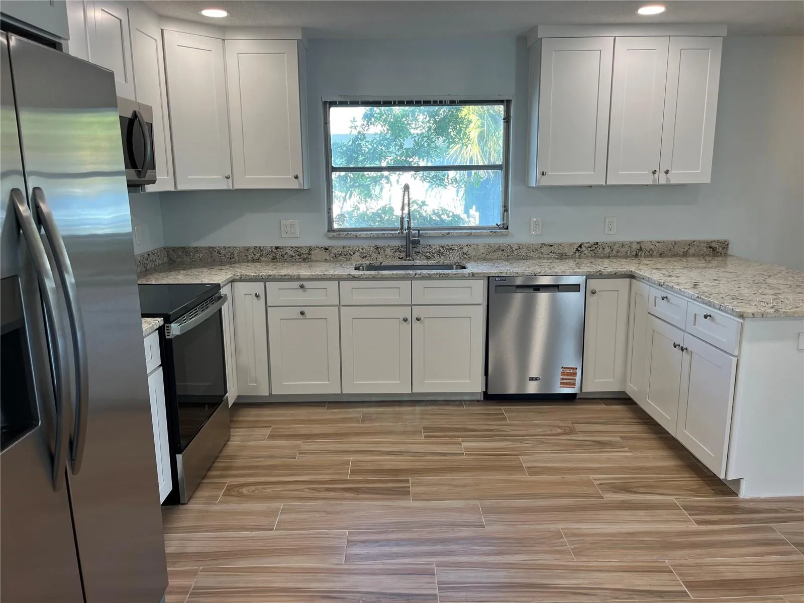 Lovely open kitchen with natural lighting