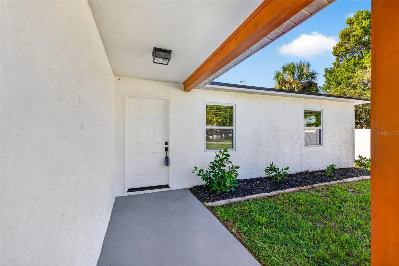 Step inside to updated flooring, fresh finishes, and an open living space.