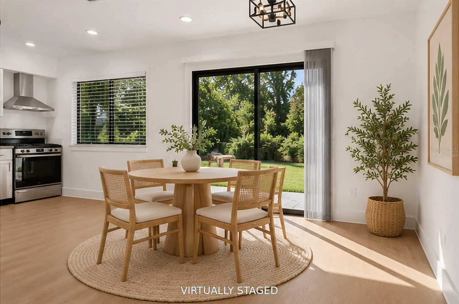 VIRTUALLY STAGED. Open dining area makes everyday meals and entertaining a breeze.