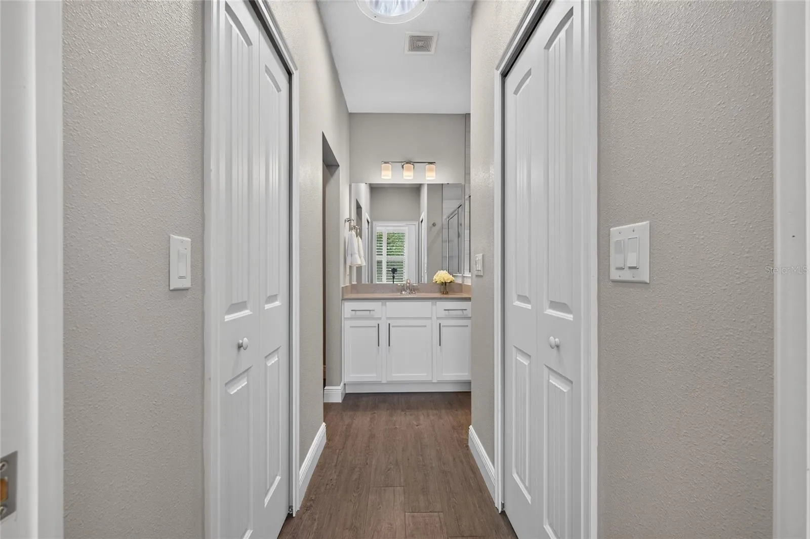 Dual closets in primary bedroom