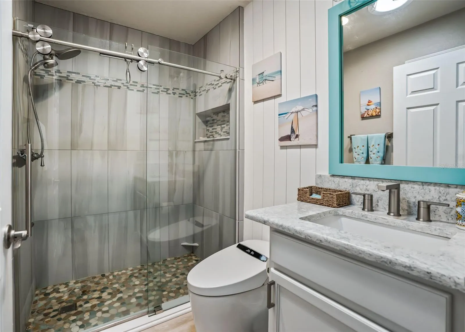 Guest Bath.  Toilet seat lifts when you.  Quartz Countertops. enter the room.