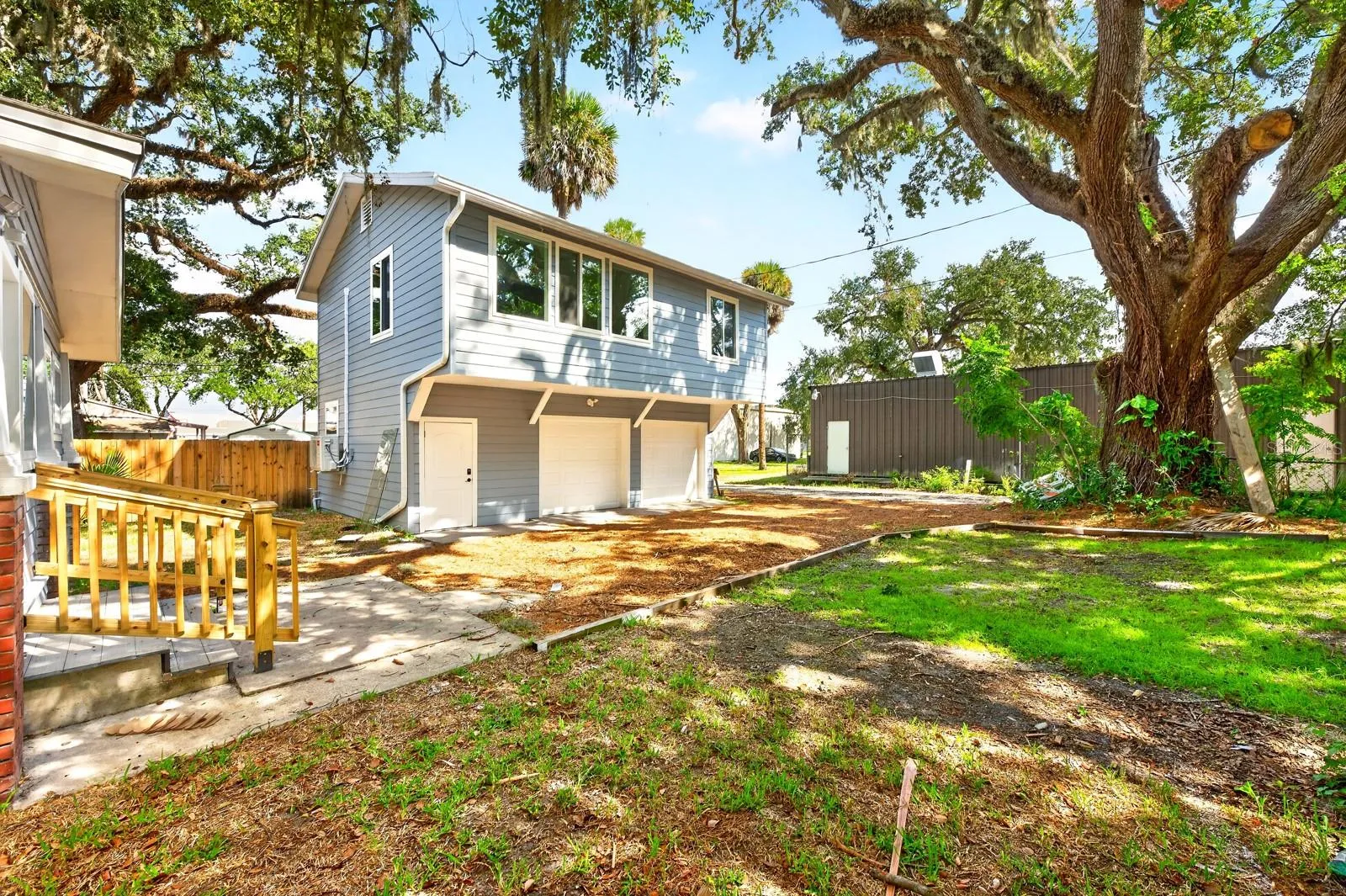 The 2-car garage and separate Guest Residence.